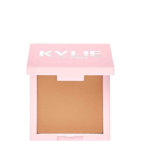 Kylie by Kylie Jenner Pressed Bronzing Powder 11g in open pink compact, showing warm tan bronzer pan