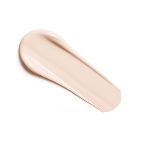 Dior Backstage Face & Body Flash Perfector Concealer swatch in a light peach-nude shade, showing smooth creamy texture