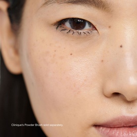 Model with Clinique Blended Face Powder in Transparency Neutral, showing a smooth, even complexion finish on skin