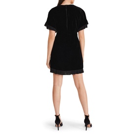 Model wearing Phase Eight Gianna Velvet Mini Dress in black, back view showing keyhole detail, fluted sleeves and pleated hem trim