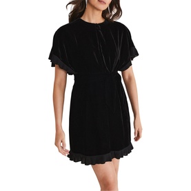 Model wearing Phase Eight Gianna Velvet Mini Dress in black with fluted sleeves, pleated hem trim, and round neck with keyhole detail