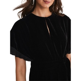 Model wearing Phase Eight Gianna Velvet Mini Dress in black, showing keyhole neckline, short fluted sleeves with pleated trim detail