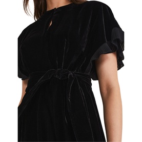 Model wearing Phase Eight Gianna Velvet Mini Dress in black, with fluted sleeves, keyhole neckline, and self-tie waist belt
