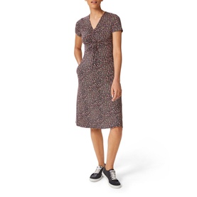 Model wearing Hobbs Simmy Dress in blue, all-over print, V-neckline, short sleeves, front gathering, knee-length, styled with white trainers