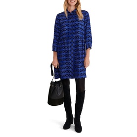 Model wearing Phase Eight Bregitta Geo Print Shirt Dress in black with blue geometric print, bracelet sleeves