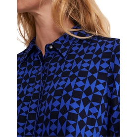 Model wearing Phase Eight Bregitta Geo Print Shirt Dress in black with blue geometric pattern, showing collar and button fastening detail