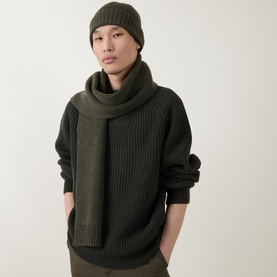 Model wearing Barbour Wool-Blend Hat & Scarf Gift Set in khaki, styled with a dark ribbed knit sweater