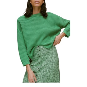 Model wearing Whistles Ink Leopard Button Front Skirt in green with subtle leopard print and button fastening, styled with a green ribbed knit top