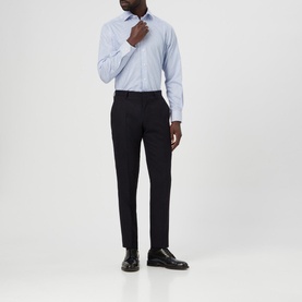 Model wearing Eton Bengal Striped Regular Fit Shirt in blue with kent collar, styled with black tailored trousers and black loafers