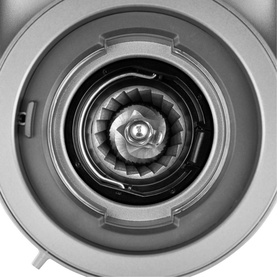 KitchenAid Artisan Coffee Grinder close-up of stainless steel burr grinding mechanism, overhead view showing conical burr detail