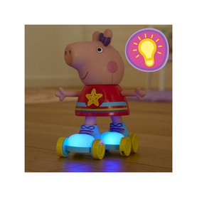 Peppa Pig Roller Disco Peppa toy figure in multi-colour, wearing red star top, on light-up roller skates with glow feature highlighted