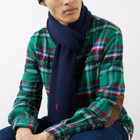 Model with Ralph Lauren Signature Pony Scarf in navy wool, styled with a green tartan shirt and jeans