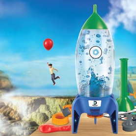 FAO Schwarz Rocket Ship Reaction Chamber science toy with blue launch base, clear water-filled bottle rocket body and green nose cone