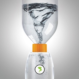 FAO Schwarz Rocket Ship Reaction Chamber toy showing swirling water vortex inside clear bottle with orange connector cap