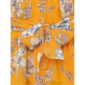 Phase Eight Emmalyn Tiered Georgette Dress in yellow, close-up of floral print fabric and tied fabric belt detail