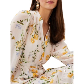 Model wearing Phase Eight Lucie Floral Maxi Shirt Dress in multi, long sleeve V-neck with yellow floral print and cinched waist