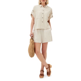 Model wearing Phase Eight Mona Co-Ord Blouse in cream with matching shorts, styled with tan wedge sandals and a woven straw bag