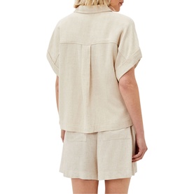 Model wearing Phase Eight Mona Co-Ord Blouse in cream, back view, styled with matching cream linen shorts