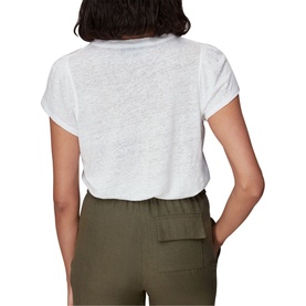 Model wearing Whistles Cada Button Linen Blend T-Shirt in white, back view, styled with olive wide-leg trousers