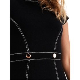 Model wearing Phase Eight Amaya Contrast Stitch Detail Dress in black, showing gold-tone button details and white contrast stitching at waist
