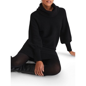 Model wearing Phase Eight Dahlie Cowl Neck Dress in black, long sleeve relaxed fit with ribbed trims, styled with black tights