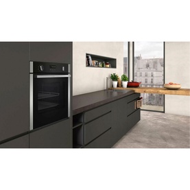 Neff T27DS79N0 75cm Black Gas Hob built into a dark kitchen unit, styled with integrated oven below and wooden countertop nearby