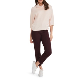 Model wearing Phase Eight Camillan Cowl Neck Sweater in pink with cowl neck and three-quarter sleeves, styled with dark burgundy trousers