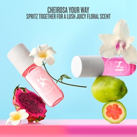 Sol De Janeiro Brazilian Crush Cheirosa 68 Body Mist duo displayed with dragon fruit, guava, and white florals on a blue background.