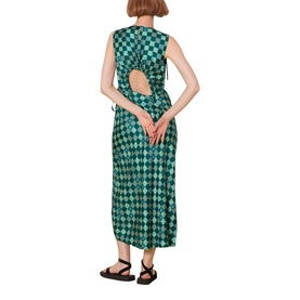 Model wearing Whistles Silk Checkerboard Midi Dress in green, back view showing open back detail, paired with black strappy sandals
