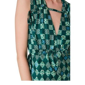 Model wearing Whistles Silk Checkerboard Midi Dress in green, showing V-neck keyhole detail and sleeveless silhouette with checkerboard print