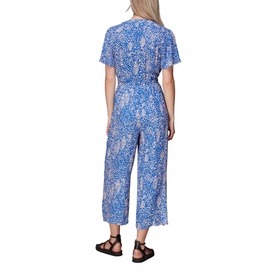 Model wearing Whistles Lively Animal Jemma Jumpsuit in blue flecked print, short frill sleeves, belt tie waist, cropped wide leg