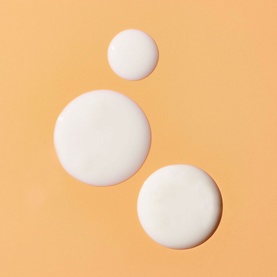 Murad Correct & Protect SPF 45 PA++++ texture swatches showing three smooth white cream drops on peach background
