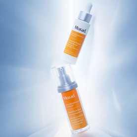 Murad Correct & Protect Broad Spectrum SPF 45 PA++++ pump bottles in orange and white shown floating on light blue background