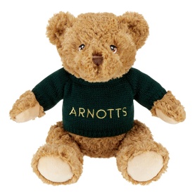 KeelCo Toys Arnotts Teddy Bear, beige plush soft toy wearing a dark green knitted sweater with Arnotts branding, embroidered eyes and nose
