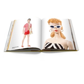 Assouline Mattel: 70 Years of Innovation and Play hardback book open showing Barbie and Ken doll illustrations across spread pages