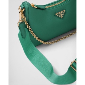 Prada Accessories Re-Edition 2005 Saffiano Leather Bag in green with gold-tone chain handle and logo-print woven nylon shoulder strap