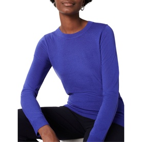 Model wearing Hobbs Penny Merino Wool Sweater in blue, crew neck with ribbed trims and long sleeves, styled with black trousers