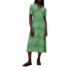 Model wearing Whistles Leopard Petals Midi Dress in green leopard print, V-neck collar, short sleeves, with black strappy sandals