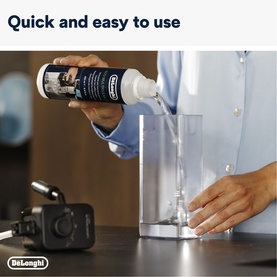 DeLonghi MultiClean Milk System Cleaner 250ml being poured into a clear container, demonstrating quick and easy use