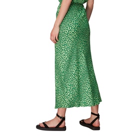 Model wearing Whistles Leopard Petals Bias Cut Skirt in green floral-leopard print with flared hem, styled with black strappy flat sandals