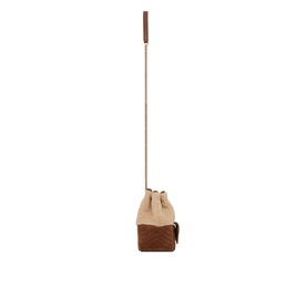 Saint Laurent Joe Shearling and Suede Mini Bucket Bag in brown, side profile showing long leather shoulder strap and chevron-quilted suede base