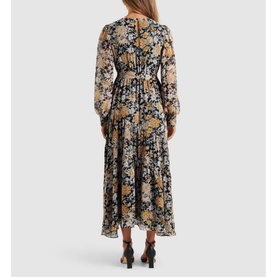 Model wearing Forever New Neve Floral High Neck Midi Dress in multi floral print, rear view showing blouson sleeves and flowing tiered skirt