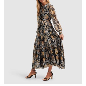 Model wearing Forever New Neve Floral High Neck Midi Dress in multi, with blouson sleeves, tiered skirt, styled with black strappy heels