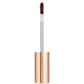 Charlotte Tilbury Beautiful Skin Radiant Concealer in deep brown shade, shown with applicator wand, gold tube, 7.2g