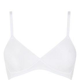 Triumph Soft Sensation Full Cup Bra in white, wireless style with slim adjustable straps and padded spacer cups with shaping effect