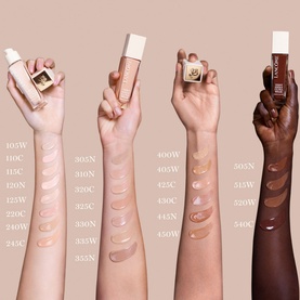 Lanc&ocirc;me Teint Idole Ultra Wear Care & Glow Foundation swatches shown across six arms in a range of skin tones with shade codes visible
