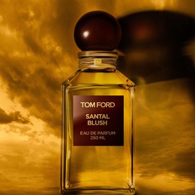 Tom Ford Santal Blush Eau de Parfum 250ml decanter bottle with dark spherical stopper against golden atmospheric background