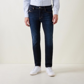 Larkee Beex Mid-Rise Tapered Jeans