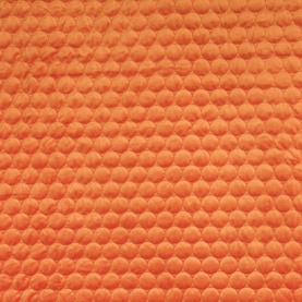 Scatterbox Halo Throw in Pumpkin orange, close-up of textured bubble pattern fabric, 140cm x 240cm