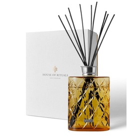 Rituals Oval Bottle Cognac gold faceted glass reed diffuser with black sticks, shown with white gift box